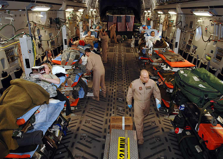 Image shows an aeromedical evacuation of injured patients.