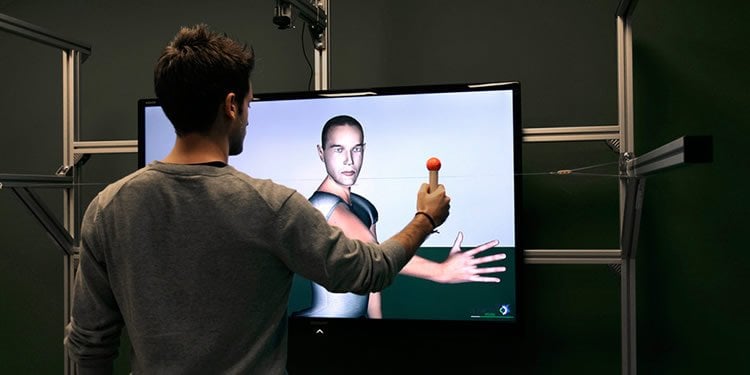 Image shows a person taking the mirror test.
