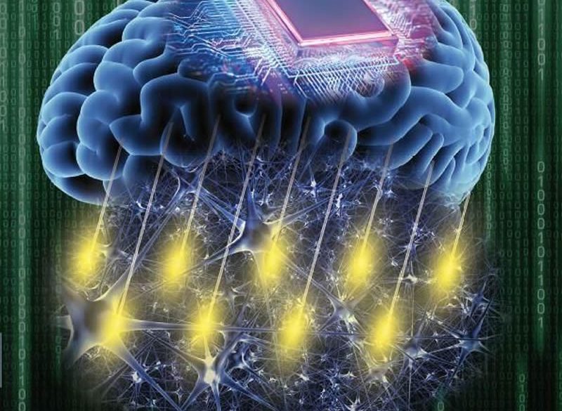 This shows a brain with a computer chip on top